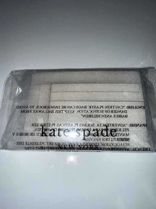 Kayla Large Slim Cardholder | Kate Spade Outlet Kate Spade Kayla Large Slim Cardholder Wallet Ivory Pebbled Leather Zip Coin